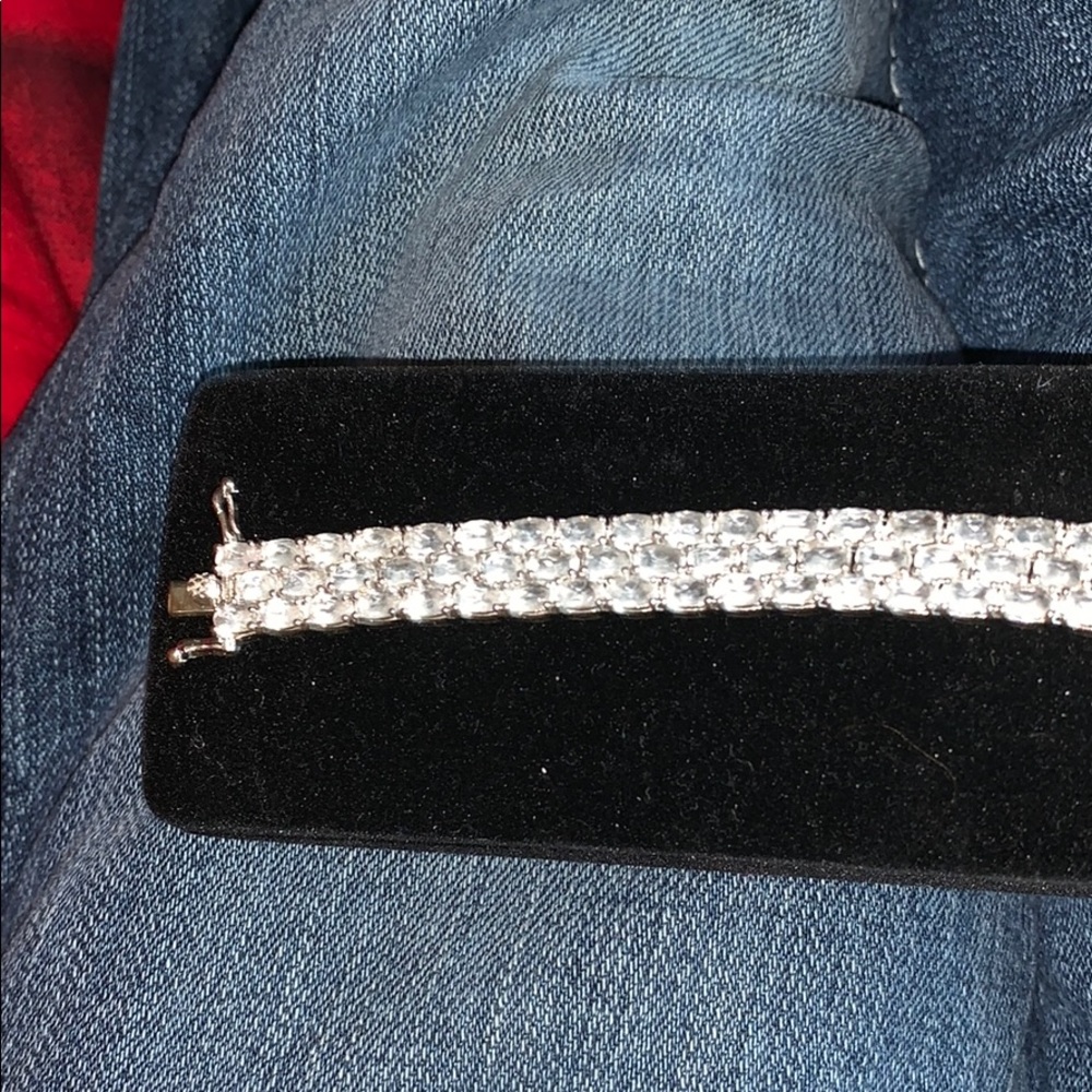 Silver bracelet with white topaz stones